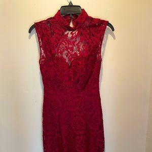 Fitted, red, lace dress with open back by Betsy & Adam; not a full length dress